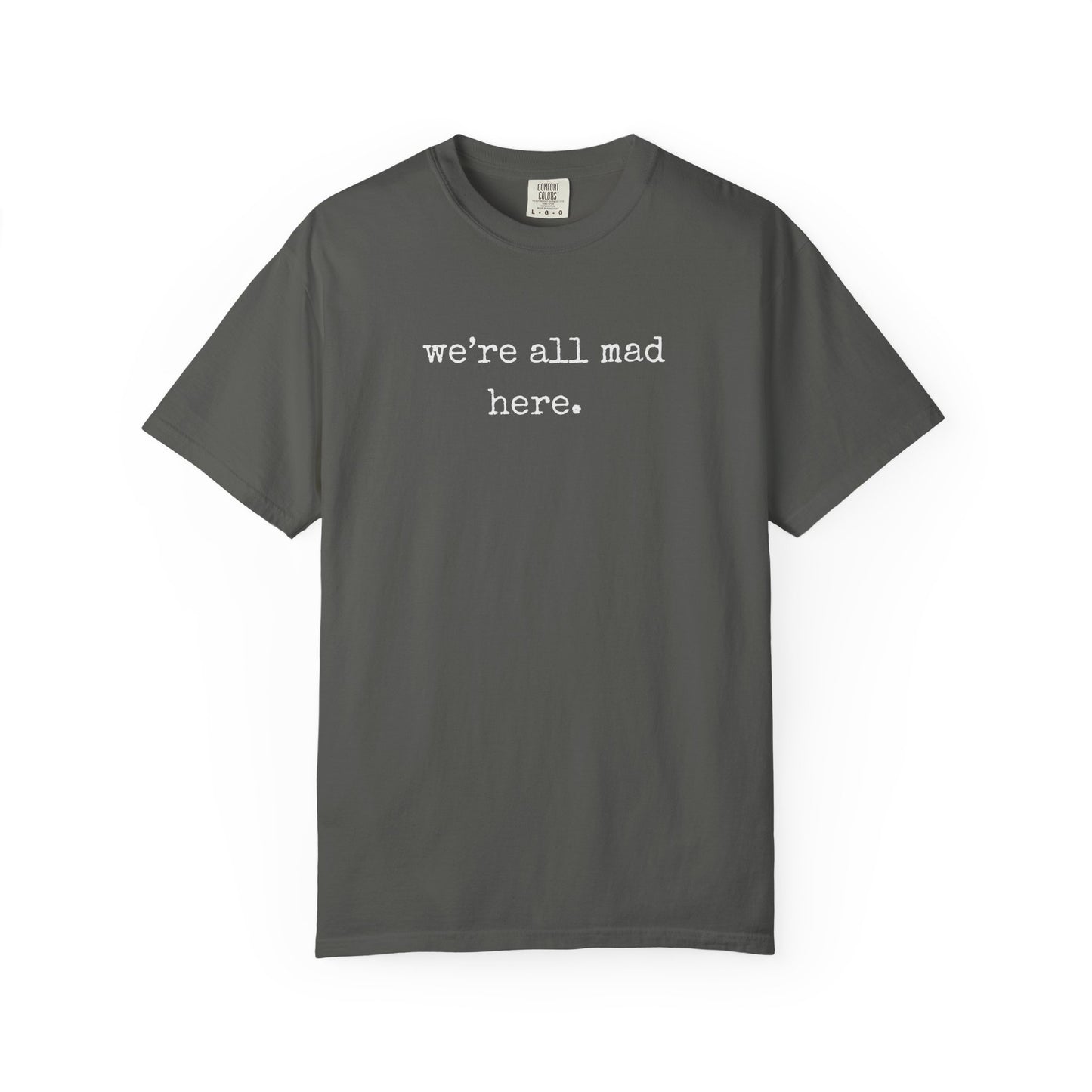 Gray t-shirt with 'we're all mad here' text on a white background
