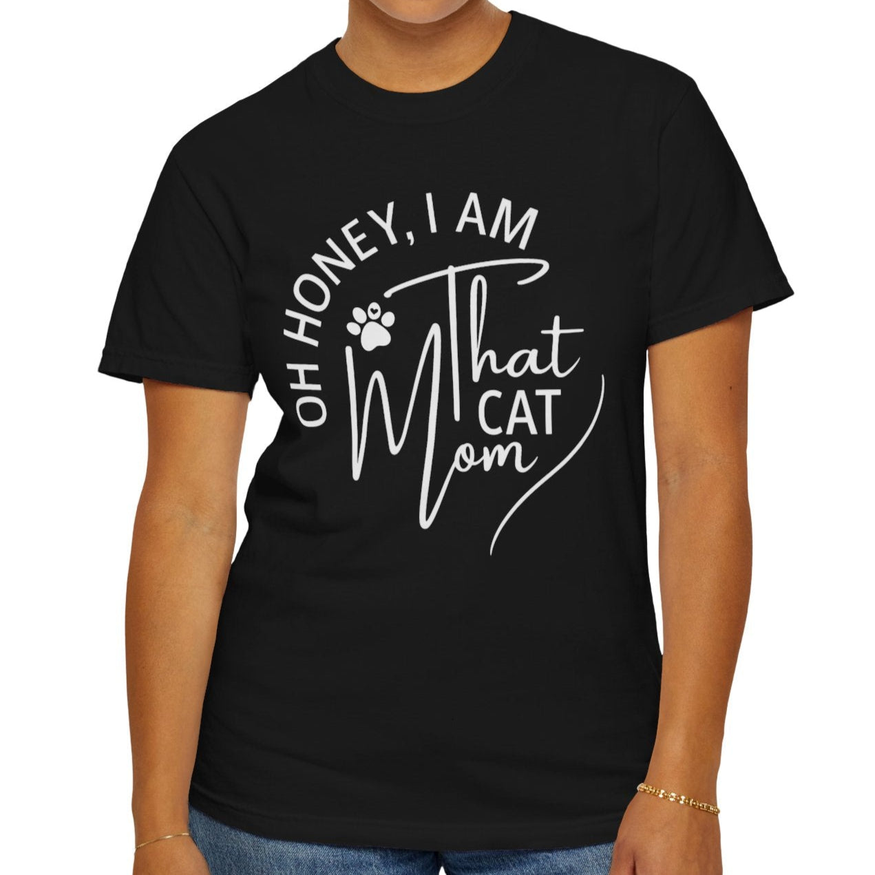 Person wearing a black comfort colors t-shirt with white text and design on a white background