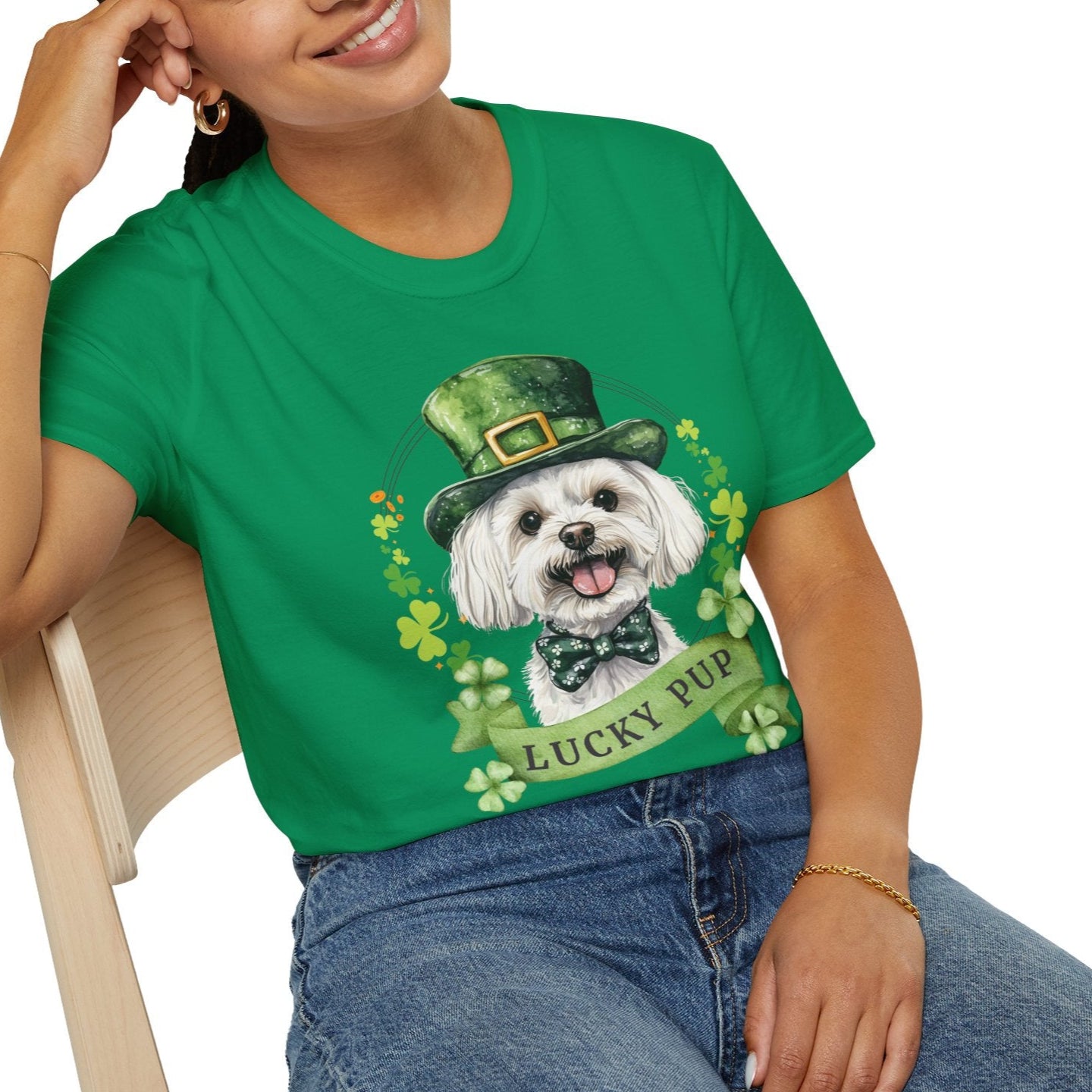 Person wearing a St. Patrick’s Day maltese dog kelly green t-shirt with a lucky shamrock print, great for dog lovers