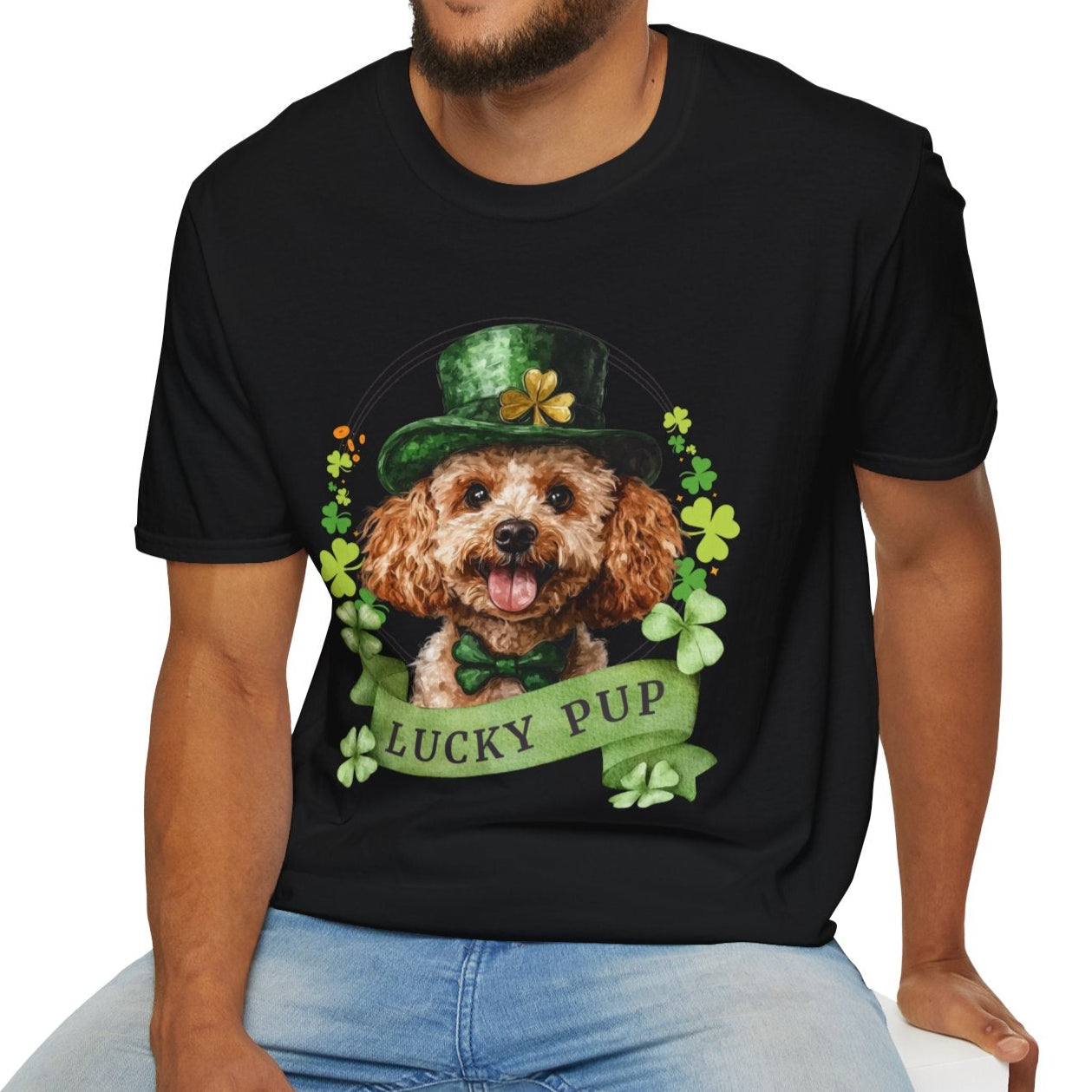 A man in a St. Patrick’s Day irish green t-shirt gift for dog lovers featuring a toy poodle dog with a shamrock garland and festive Irish design