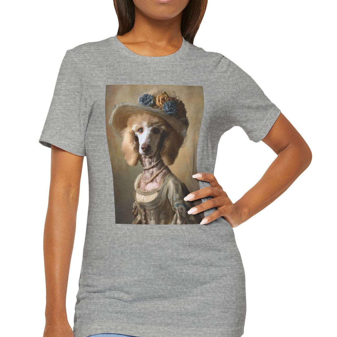 Woman wearing a gray t-shirt with a dog in a hat graphic on a white background