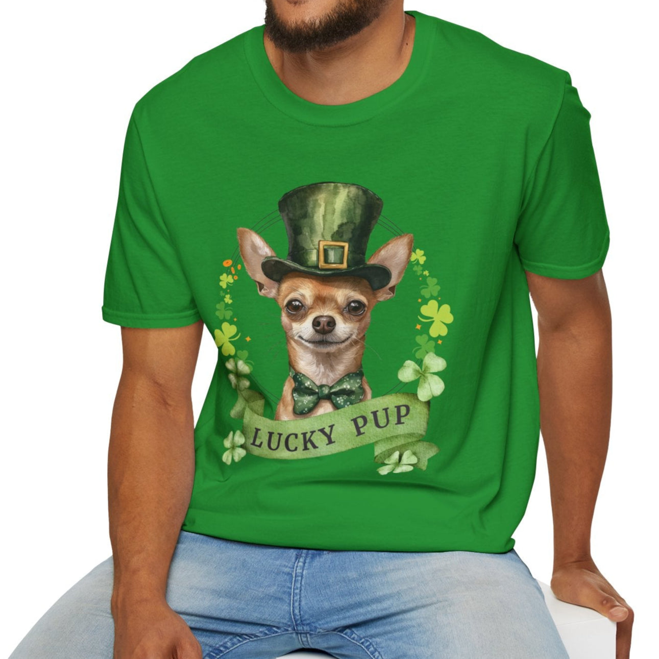 a man in a St. Patrick’s Day t-shirt featuring a Chihuahua dog with a shamrock garland and festive Irish design