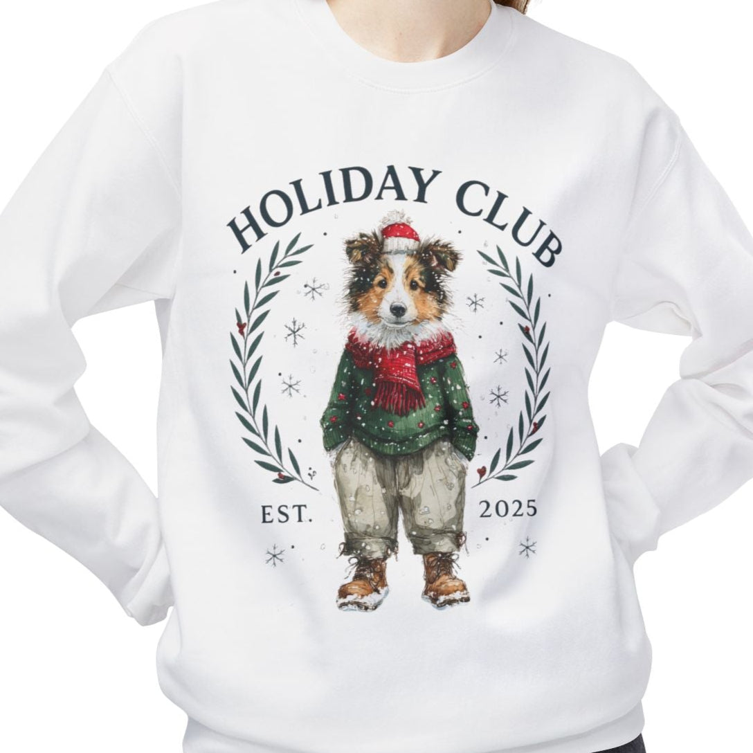 Person wearing a white sweatshirt with a dog graphic and 'Holiday Club' text on a white background