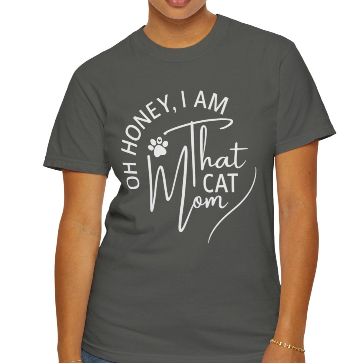 Woman wearing apepper comfort colors t-shirt with text design on a white background