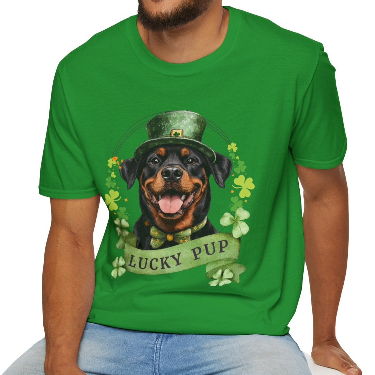 A man in a St. Patrick’s Day irish green t-shirt gift for dog lovers featuring a Rottweiler dog with a shamrock garland and festive Irish design