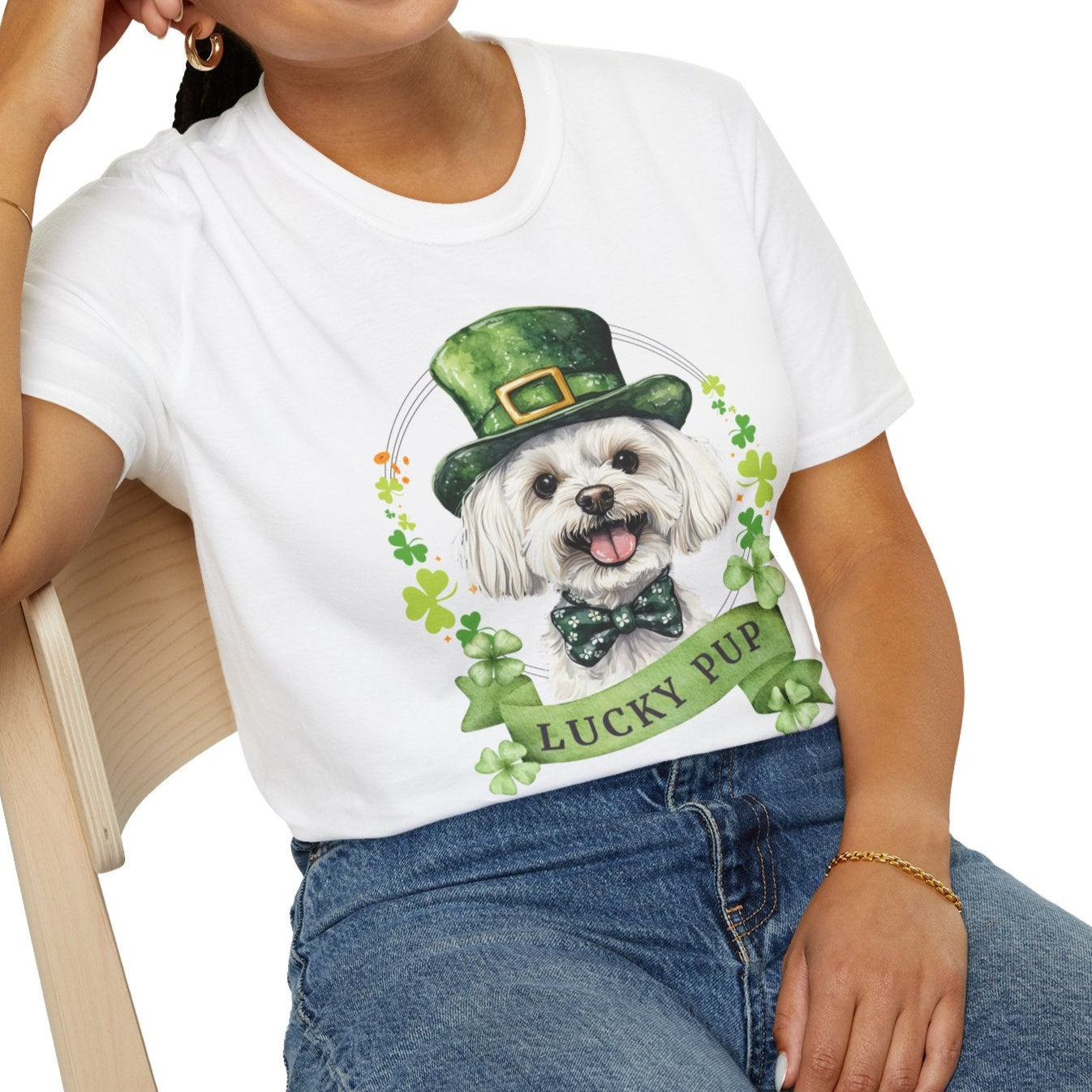 Person wearing a St. Patrick’s Day maltese dog t-shirt with a lucky shamrock print, great for dog lovers