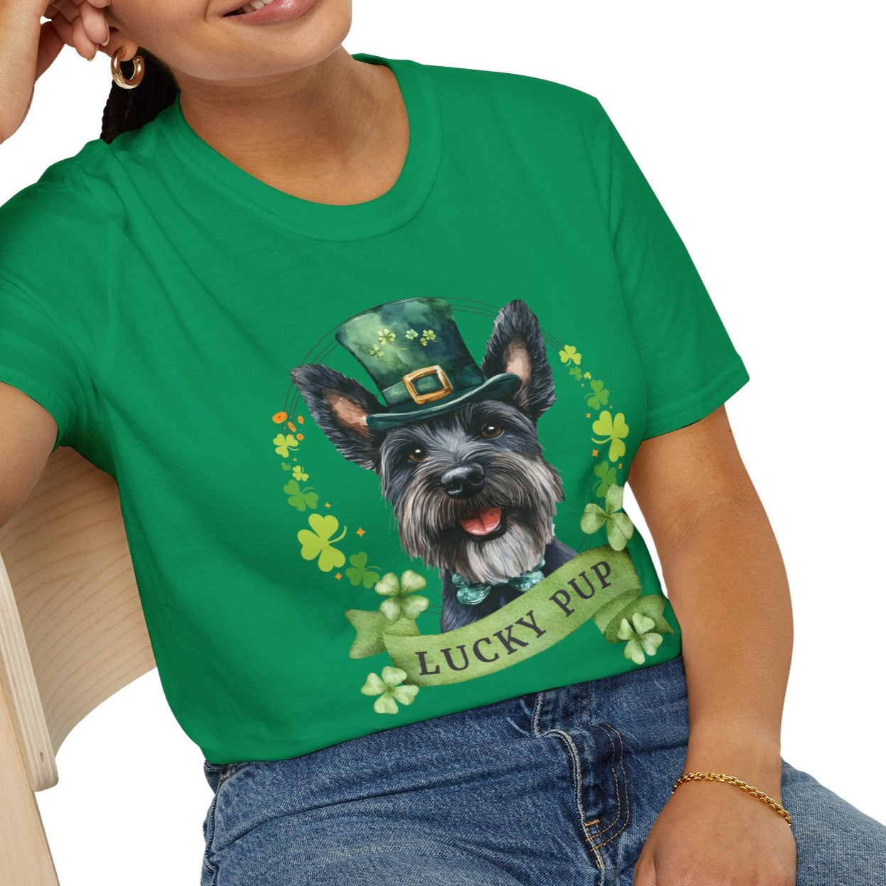 A person wearing St. Patrick’s Day scottish terrier dog kelly green t-shirt with a lucky shamrock print, great for dog lovers