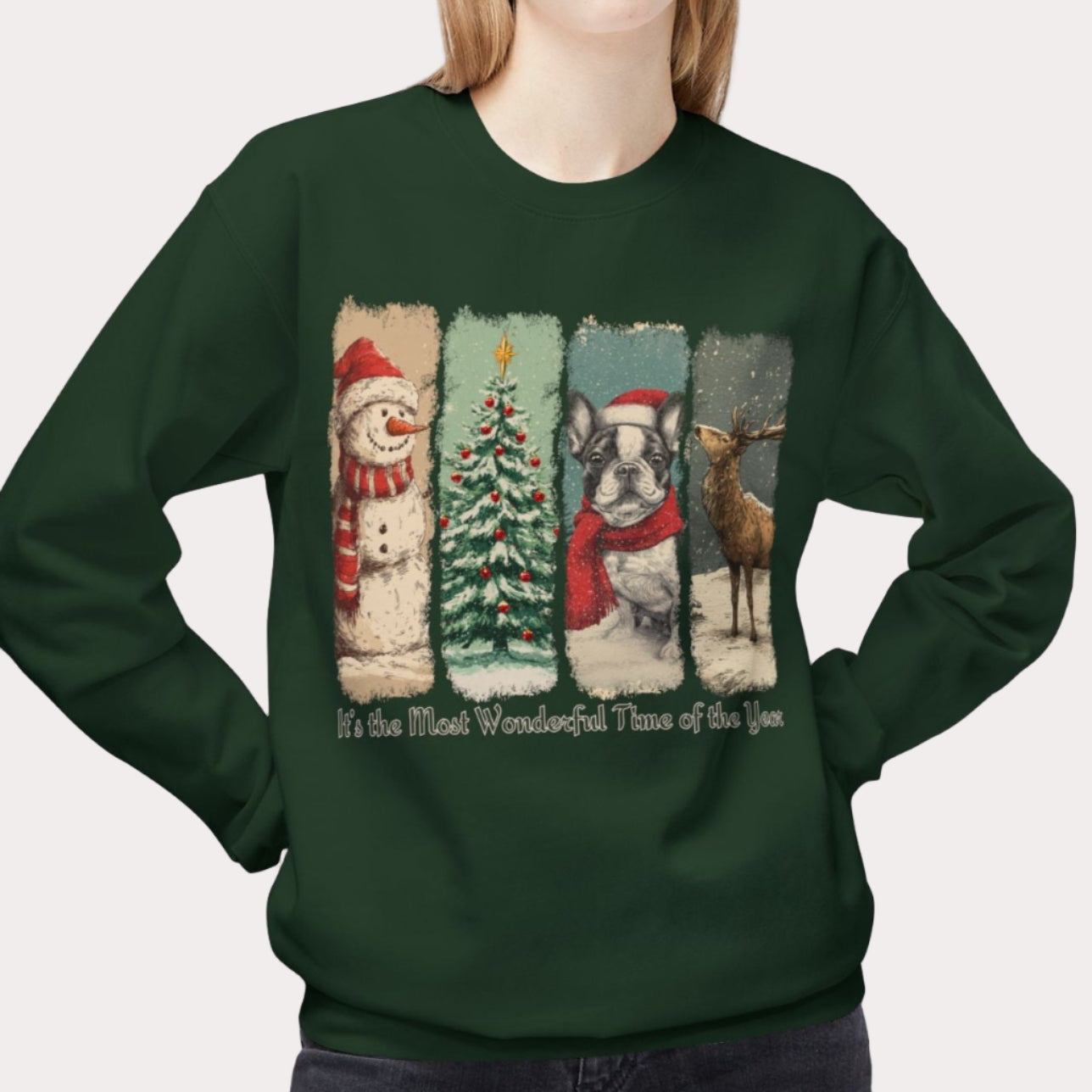 Person wearing a green Christmas-themed sweatshirt with festive illustrations.