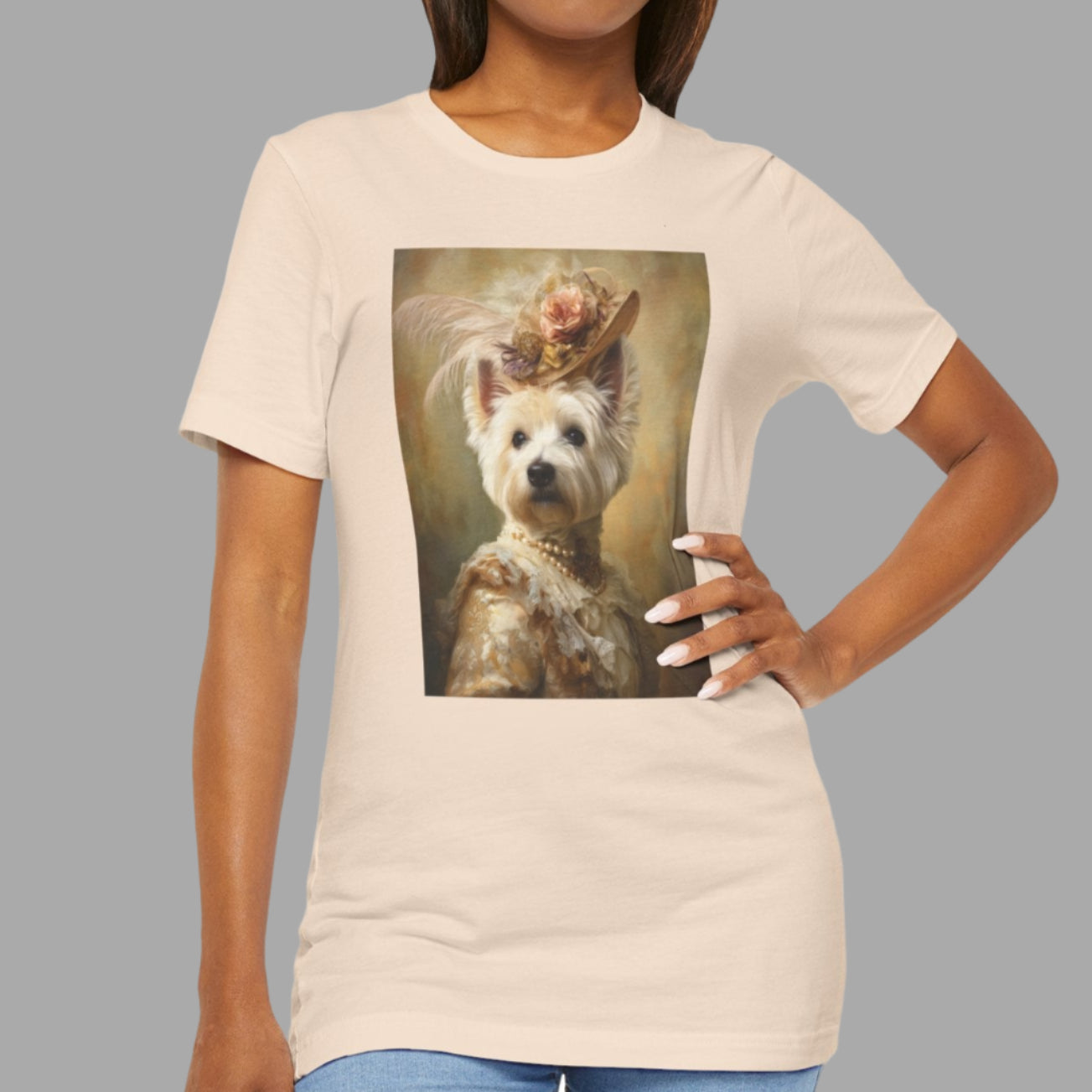 Woman wearing a cream t-shirt with a dog graphic on a white background