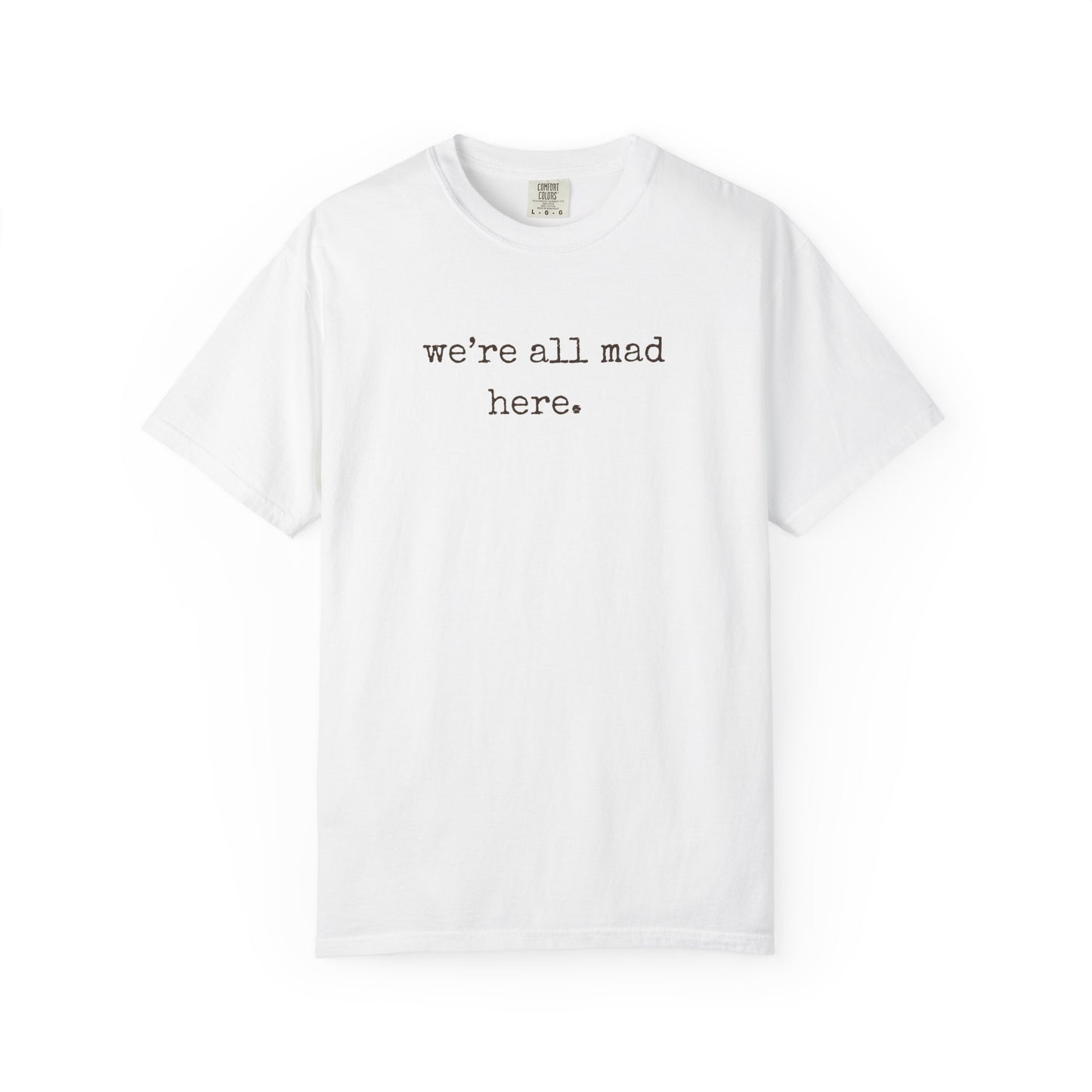 White t-shirt with 'we're all mad here.' text on a white background