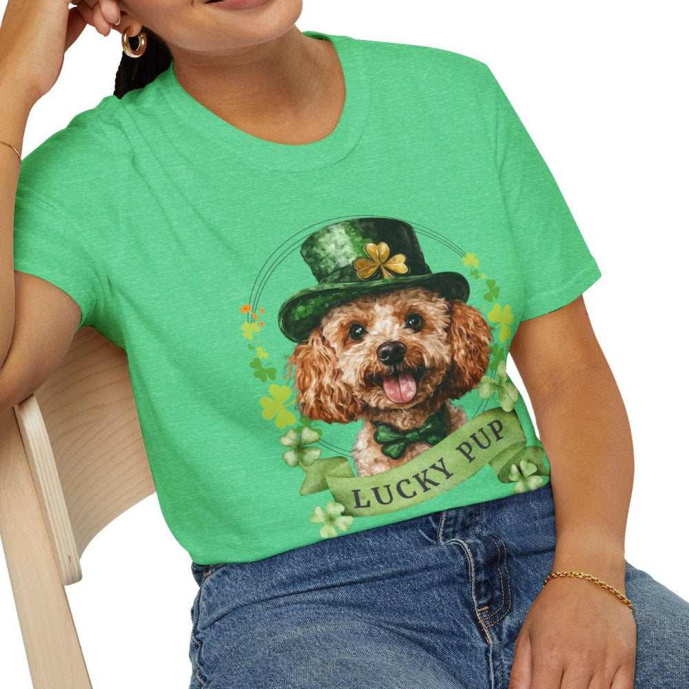 A woman in a St. Patrick’s Day heather kelly green t-shirt gift for dog lovers featuring a toy poodle dog with a shamrock garland and festive Irish design
