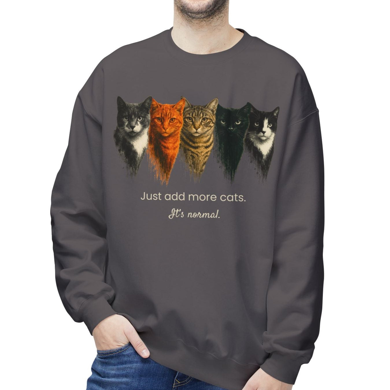 Man wearing a asphalt sweatshirt with cat illustrations and text on a white background