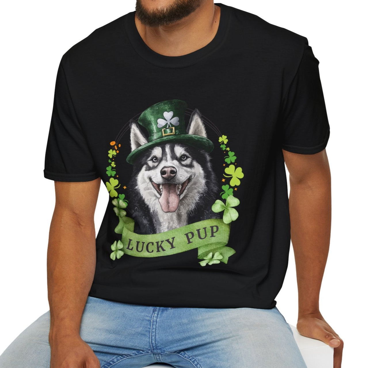 A man in a black St. Patrick’s Day t-shirt gift for dog lovers featuring Siberian Husky dog with a shamrock garland and festive Irish design