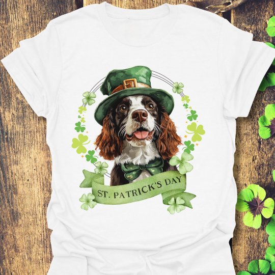 St. Patrick’s Day white t-shirt featuring an English springer spaniel dog with a shamrock garland and festive Irish design
