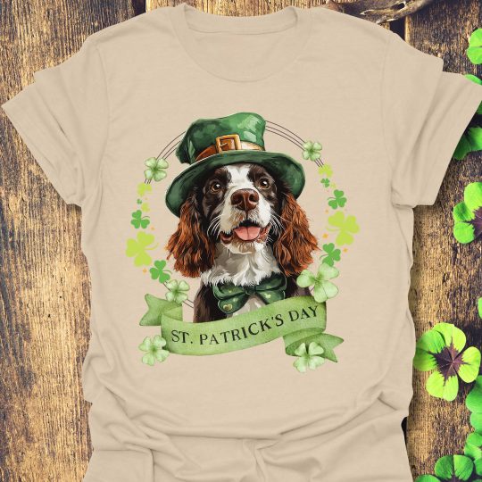 St. Patrick’s Day sand color t-shirt featuring an English springer spaniel dog with a shamrock garland and festive Irish design