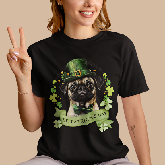 woman in a black St. Patrick’s Day t-shirt featuring a pug dog with a shamrock garland and festive Irish design