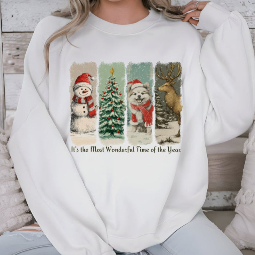 Person wearing a white sweatshirt with Christmas-themed graphics and text.