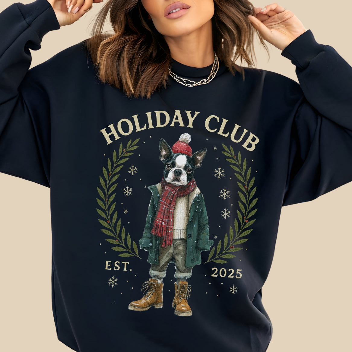 Navy blue sweatshirt with 'Holiday Club' design featuring a dog in winter clothing on a beige background.