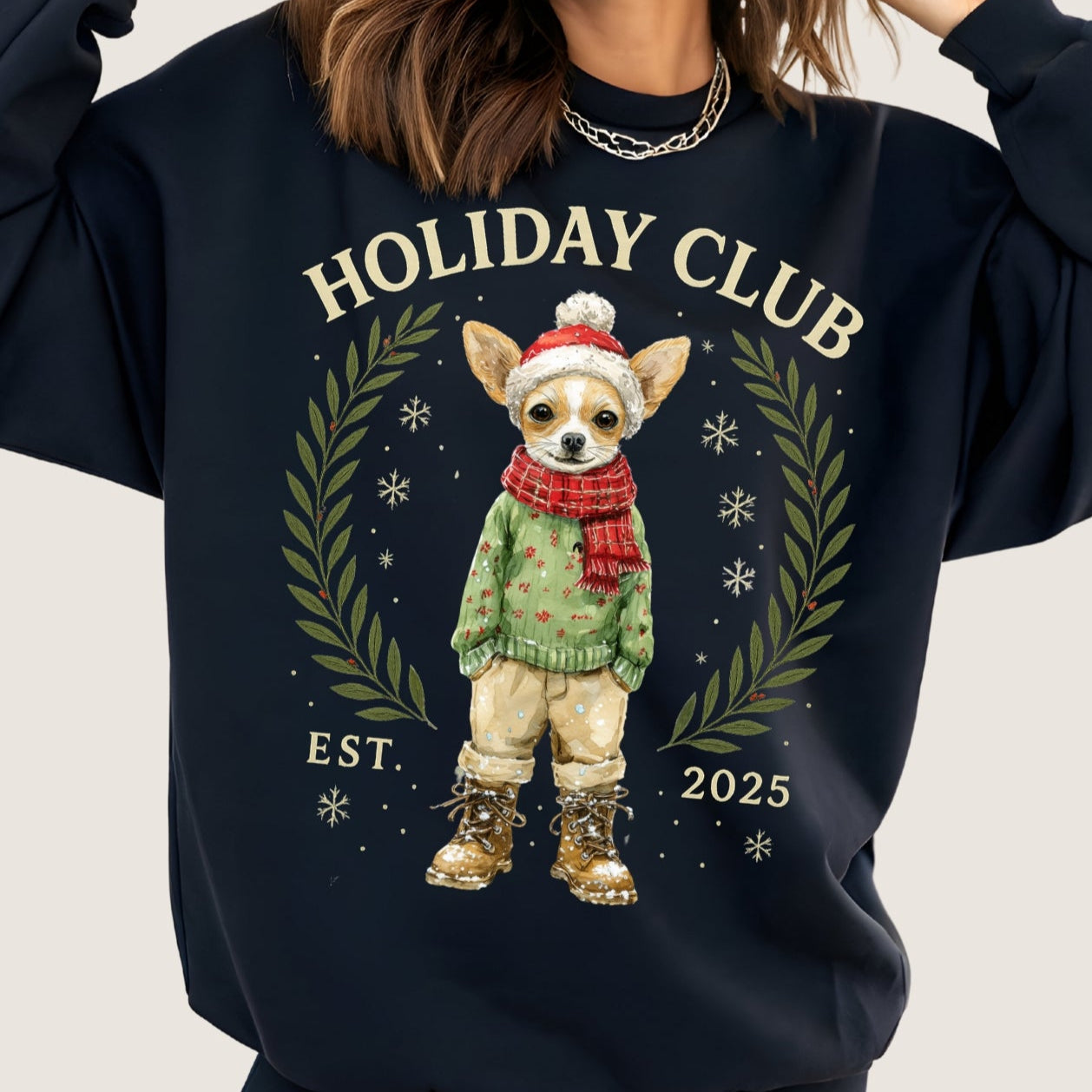 black sweatshirt with a chihuahua illustration and 'Holiday Club' text on a plain background