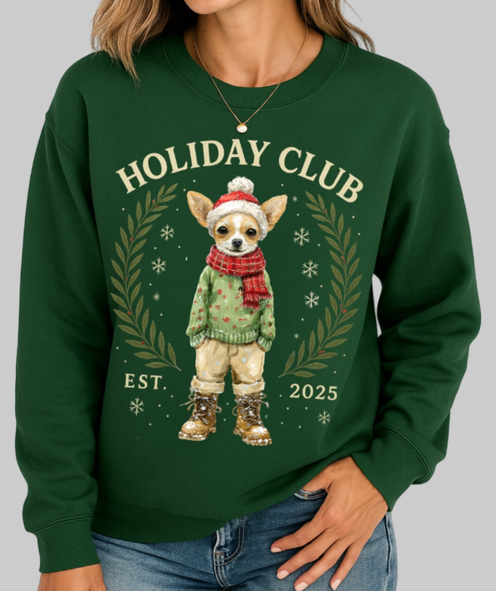 Green sweatshirt with 'Holiday Club' design featuring a dog in winter attire, worn by a person.