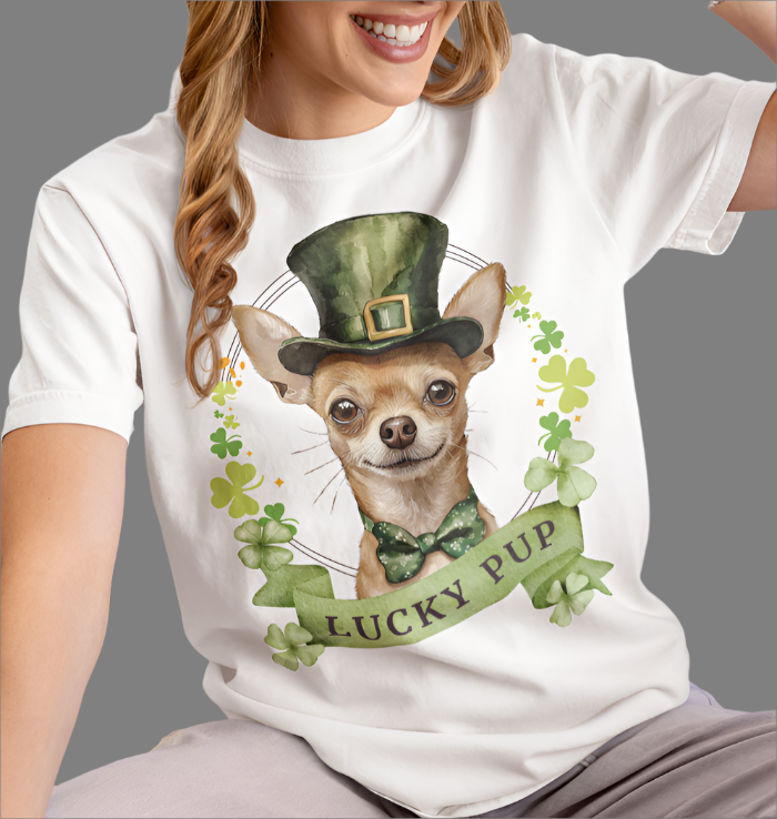a woman in a St. Patrick’s Day white t-shirt featuring a Chihuahua dog with a shamrock garland and festive Irish design