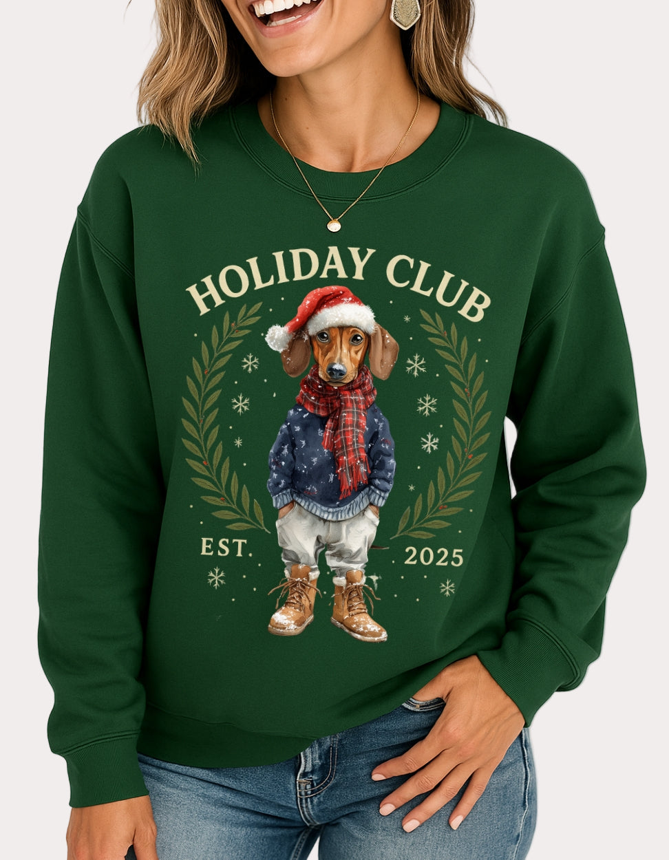 Person wearing a green sweatshirt with a Christmas-themed design featuring a dog and 'Holiday Club' text.