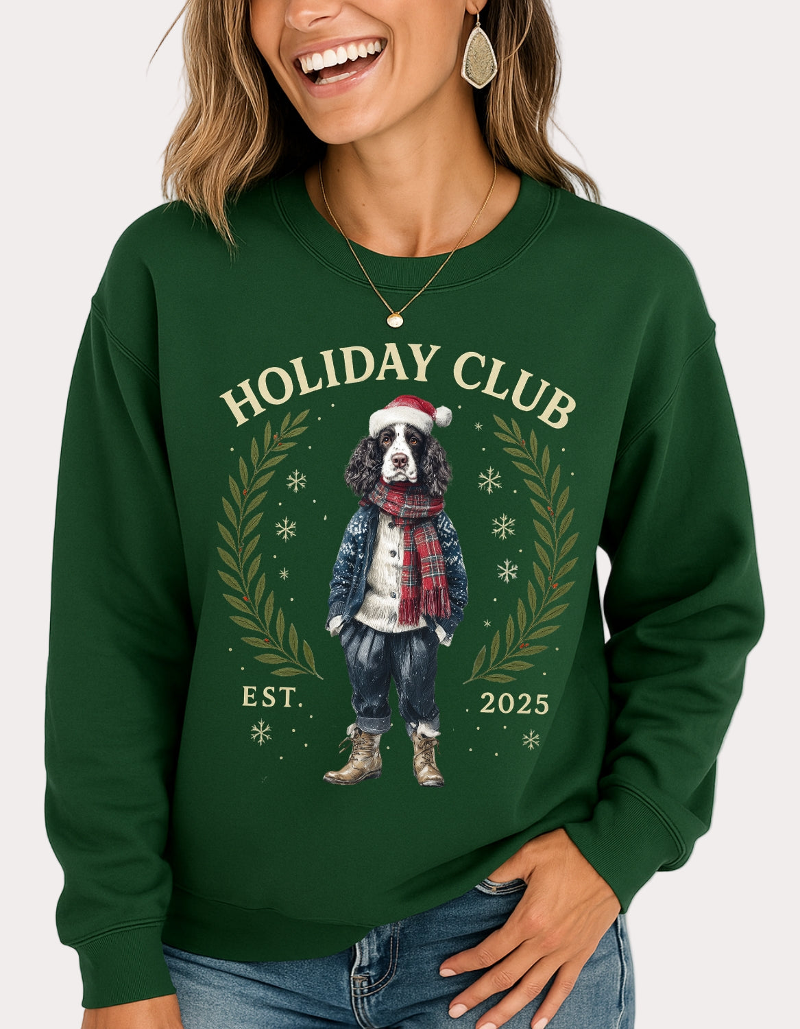 Person wearing a green sweatshirt with a holiday-themed design featuring a dog and text.