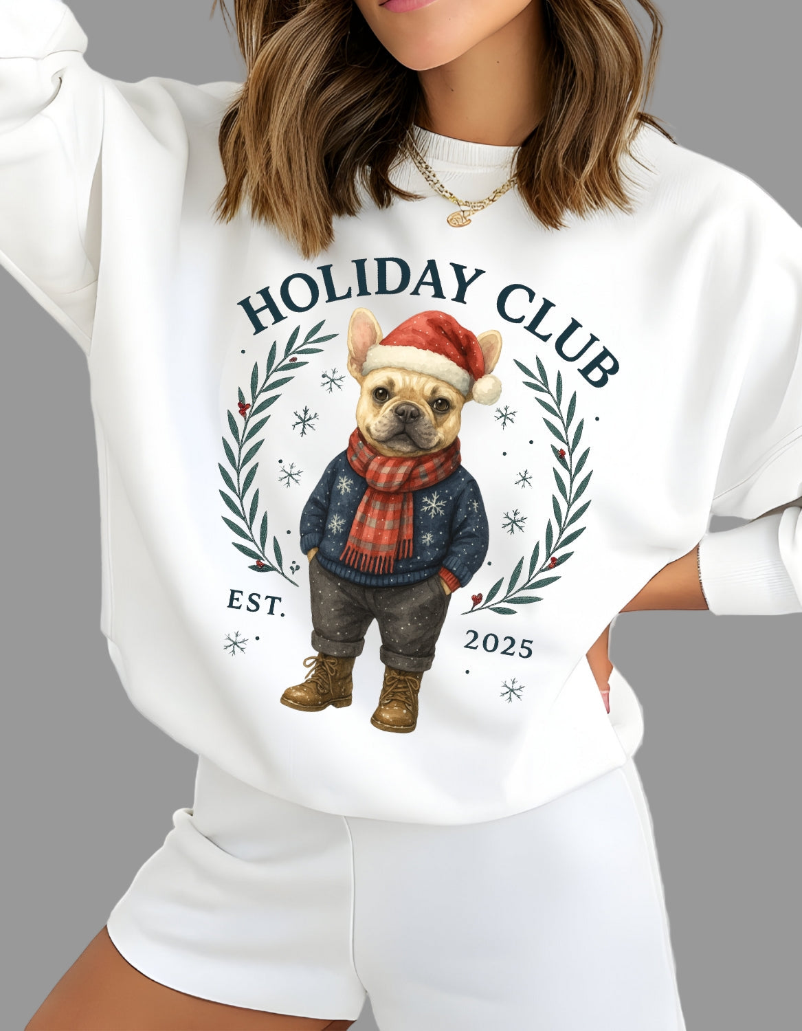 White sweatshirt with a Christmas-themed design of a dog and text 'Holiday Club' worn by a person.