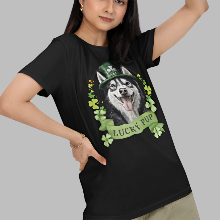 A woman in a black St. Patrick’s Day t-shirt gift for dog lovers featuring Siberian Husky dog with a shamrock garland and festive Irish design