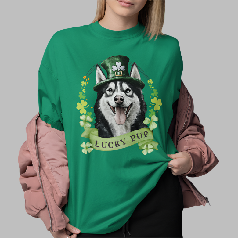 A woman in a kelly green St. Patrick’s Day t-shirt gift for dog lovers featuring Siberian Husky dog with a shamrock garland and festive Irish design