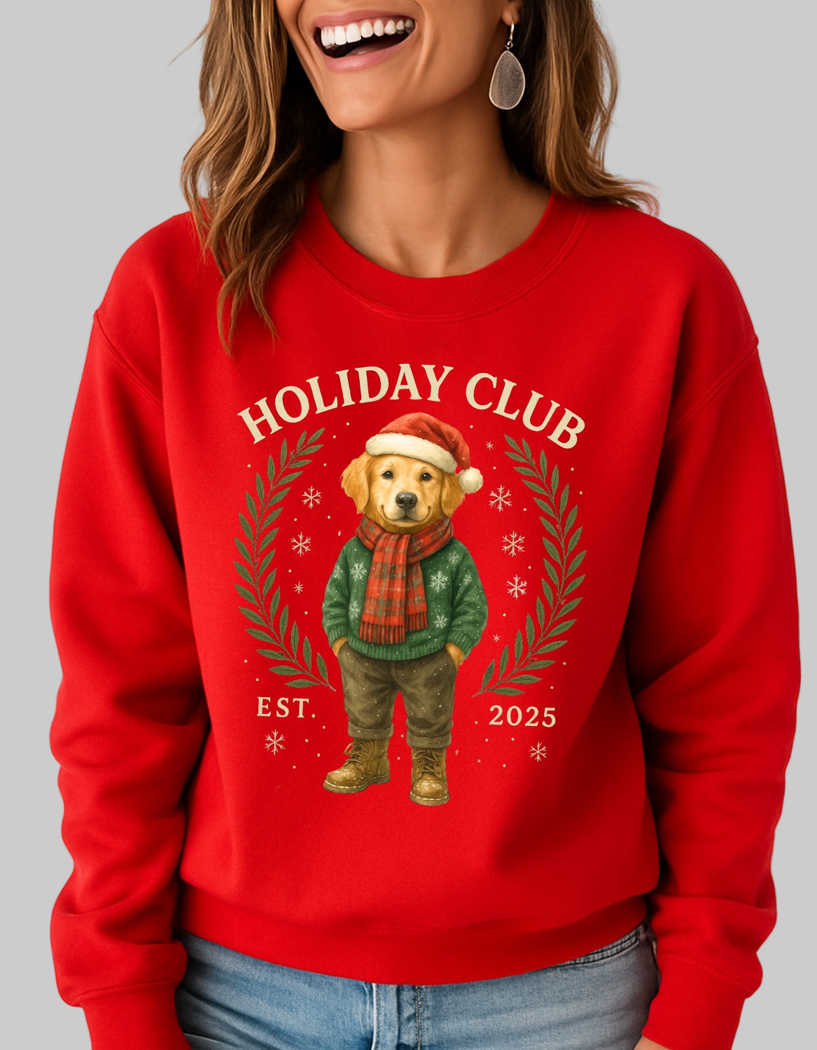 Person wearing a red sweatshirt with a bear graphic and 'Holiday Club' text on a plain background