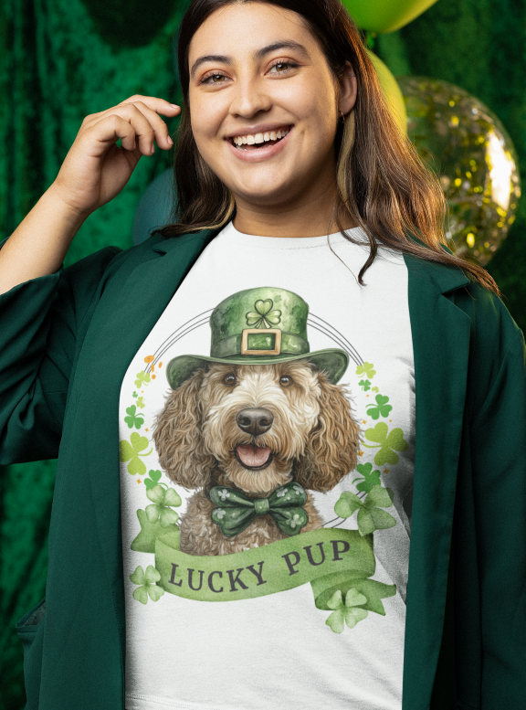 woman in white St. Patrick’s Day t-shirt featuring a labradoodle dog with a shamrock garland and festive Irish design