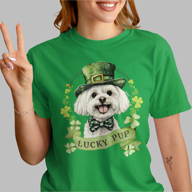 Person wearing a St. Patrick’s Day maltese dog t-shirt with a lucky shamrock print, great for dog lovers