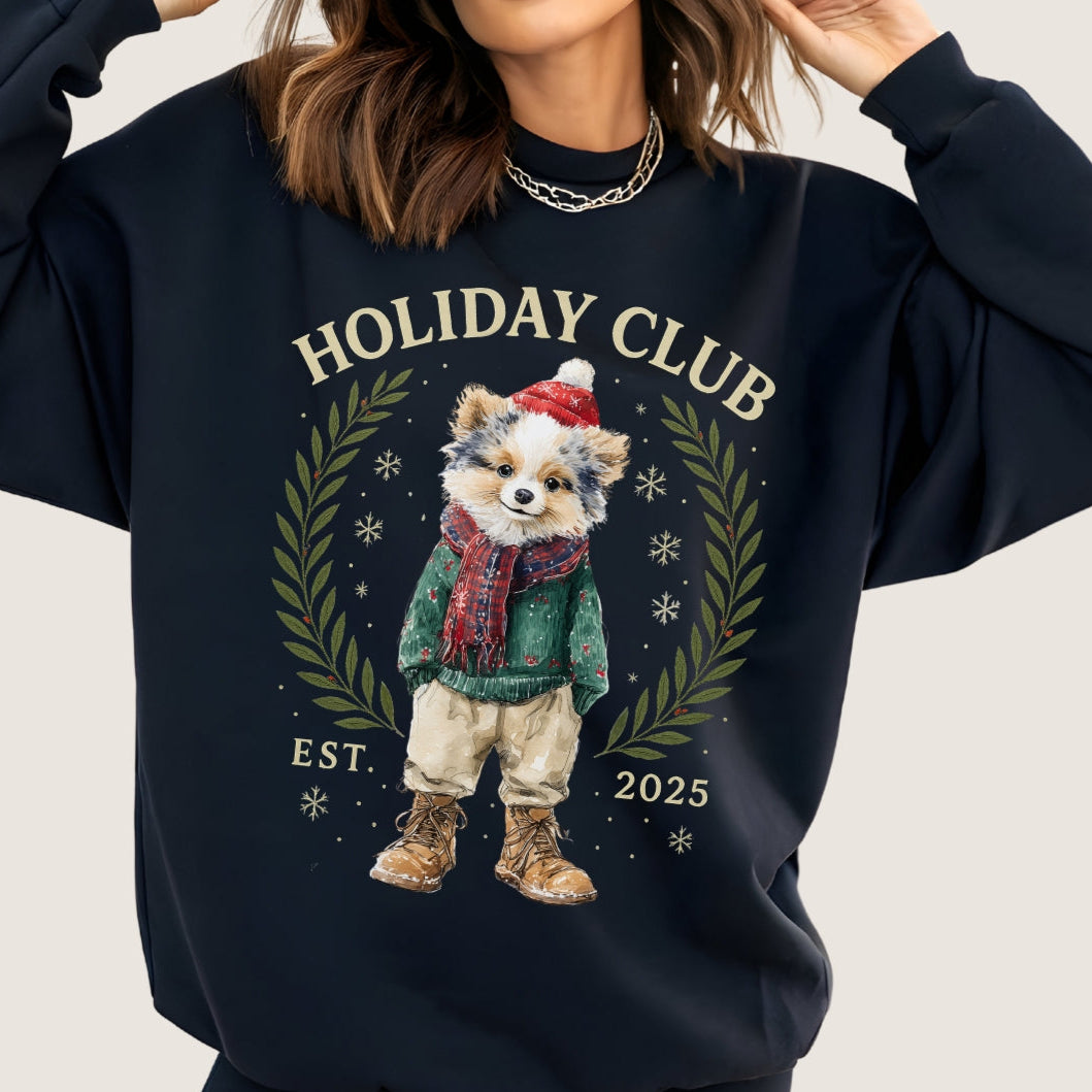 black sweatshirt with 'Holiday Club' design featuring a dog in a wreath on a light gray background