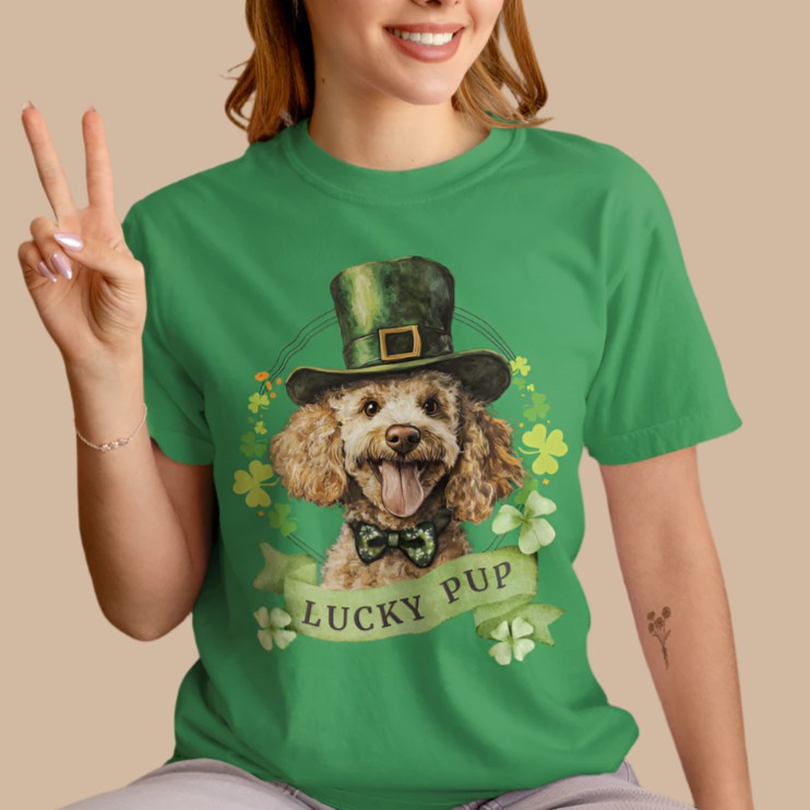 a woman wearing an irish green St. Patrick’s Day t-shirt featuring a Poodle dog with a shamrock garland and festive Irish design