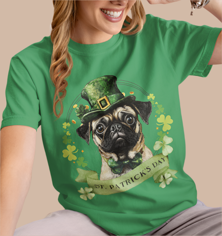 woman in a kelly green St. Patrick’s Day t-shirt featuring a Papillon dog with a shamrock garland and festive Irish design