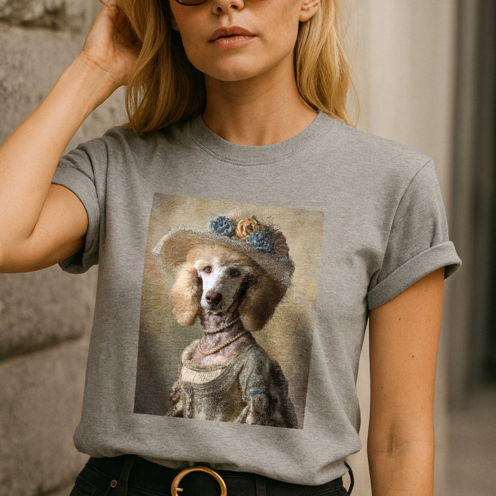 Woman wearing a gray t-shirt with a dog graphic design.