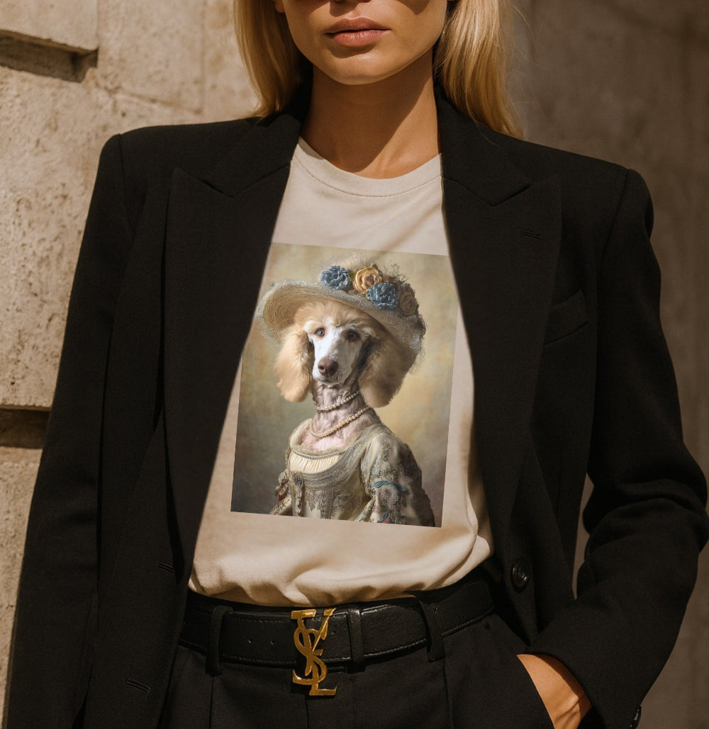Person wearing a black blazer and sunglasses, with a t-shirt featuring a dog in a hat design.
