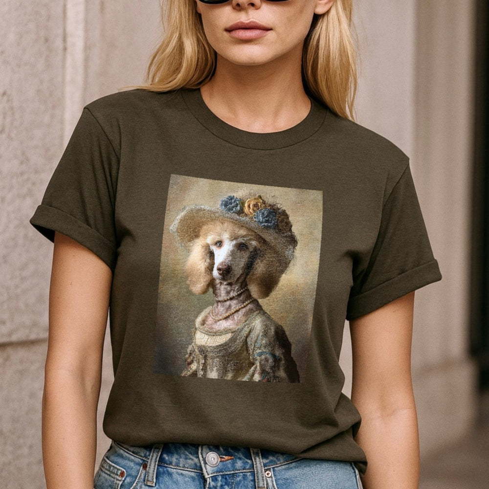 Woman wearing a t-shirt with a dog's portrait on it, standing against a neutral background.