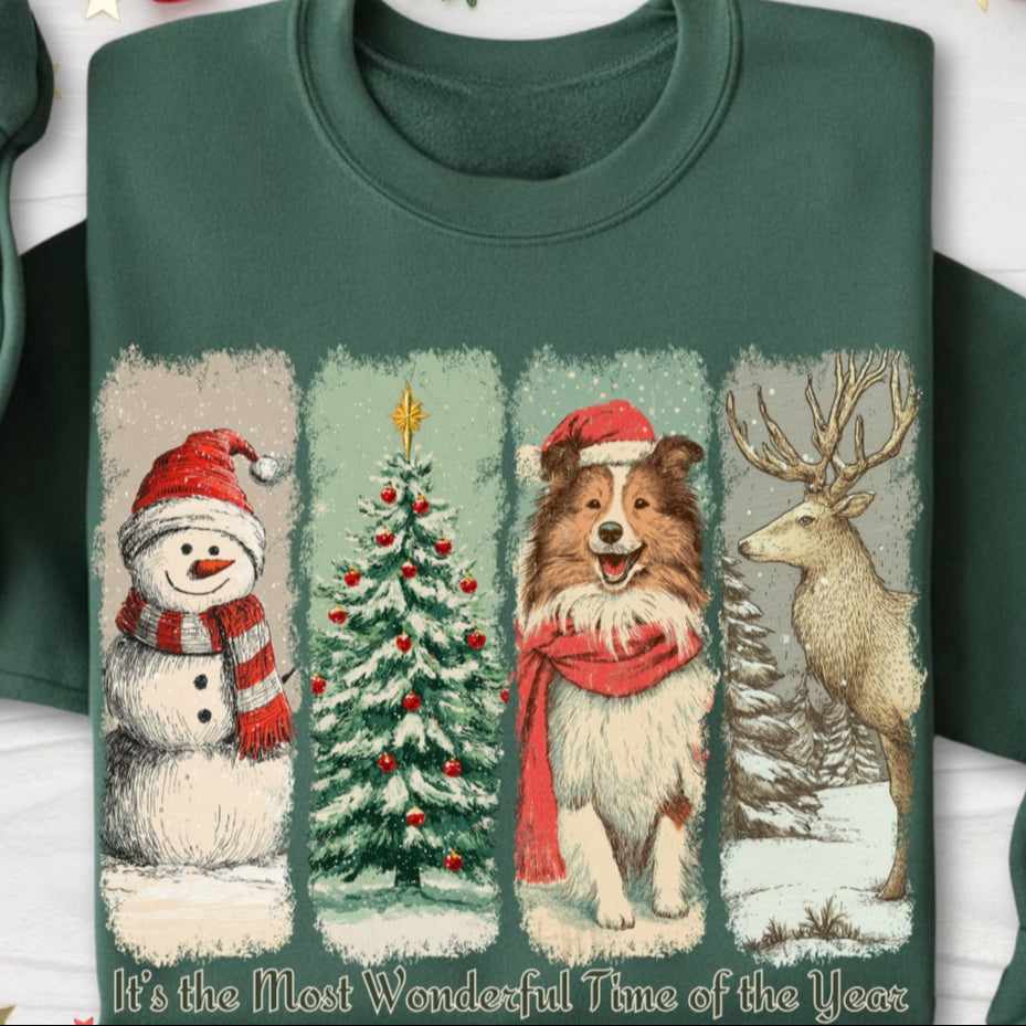 Green sweatshirt with Christmas-themed design featuring a snowman, tree, dog, and deer.