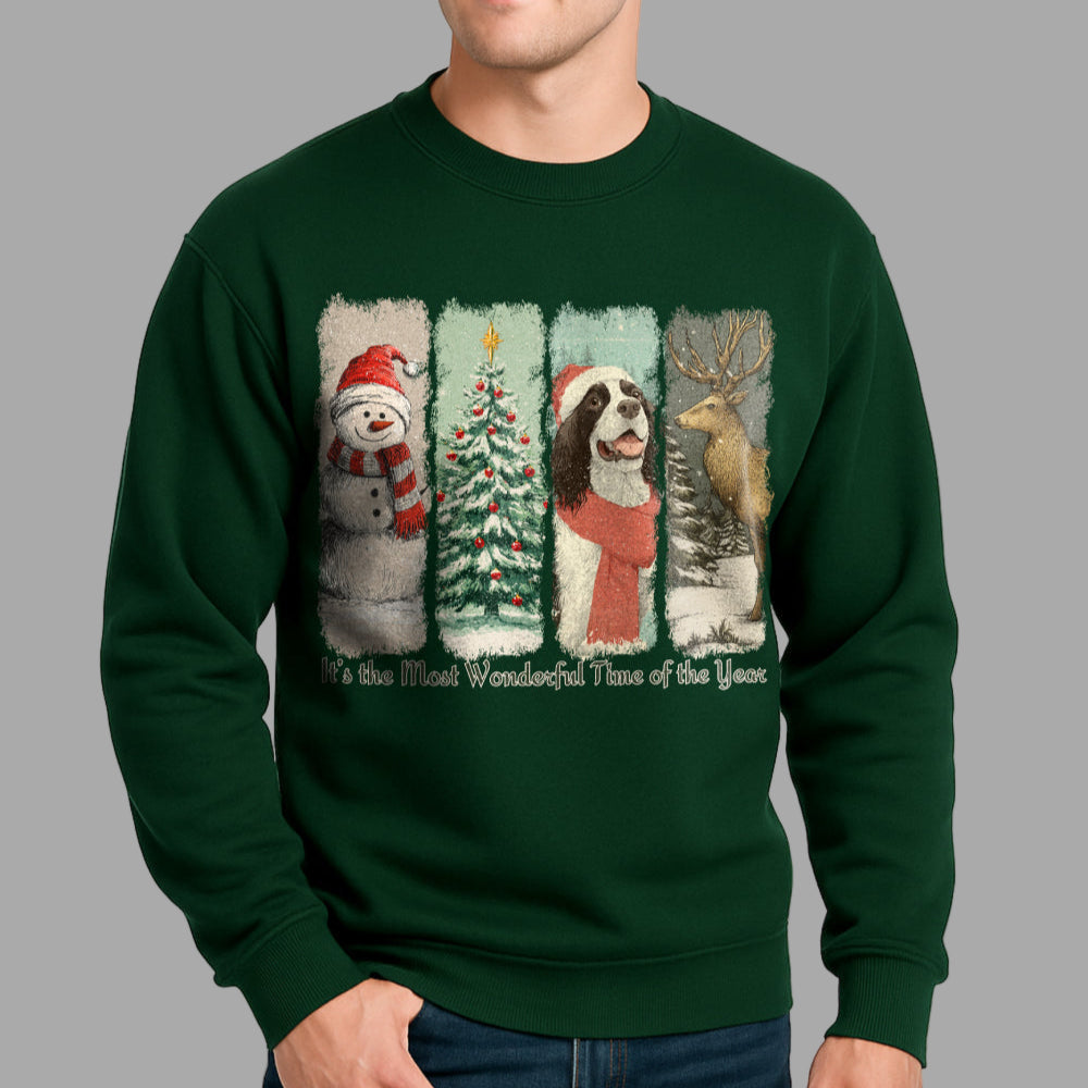 Green sweatshirt with Christmas-themed design featuring a snowman, tree, dog, and deer.