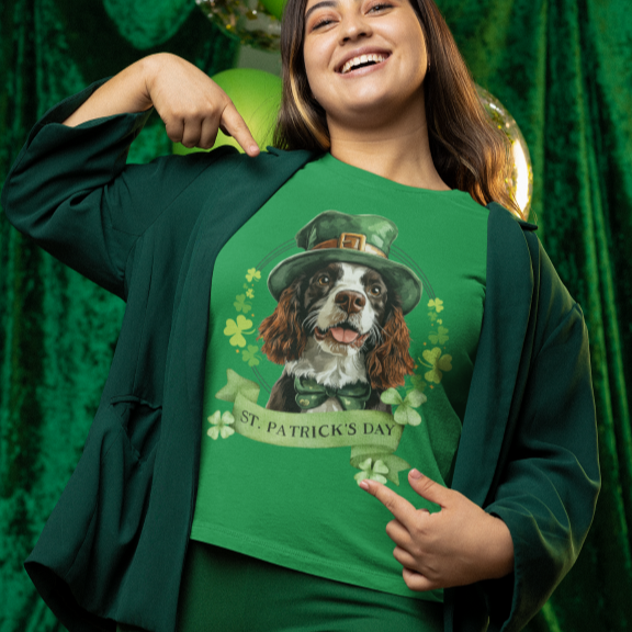 woman wears St. Patrick’s Day t-shirt featuring an English springer spaniel dog with a shamrock garland and festive Irish design