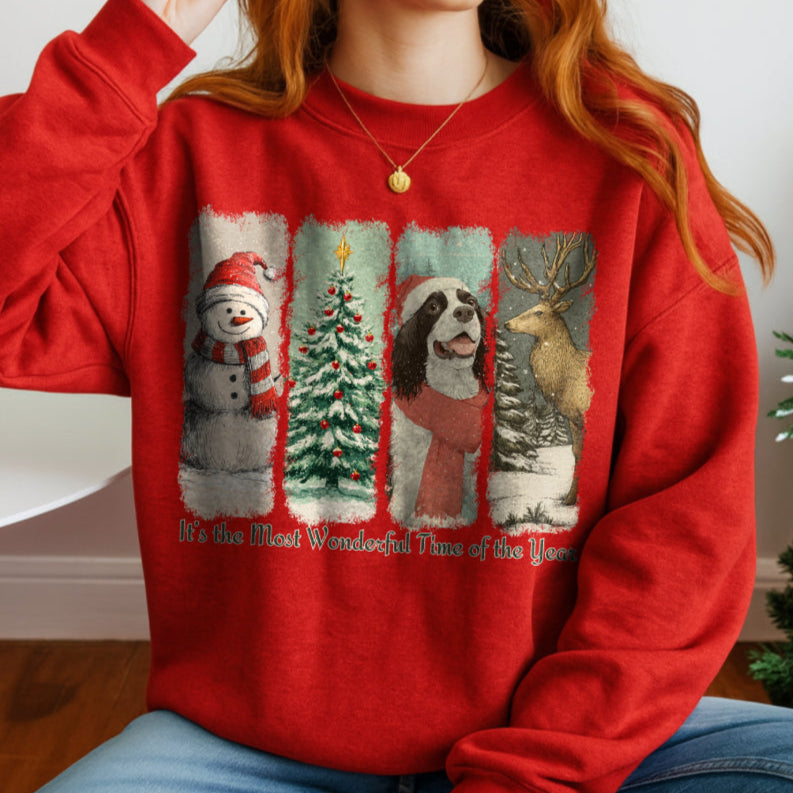 Person wearing a red Christmas-themed sweatshirt with festive graphics.