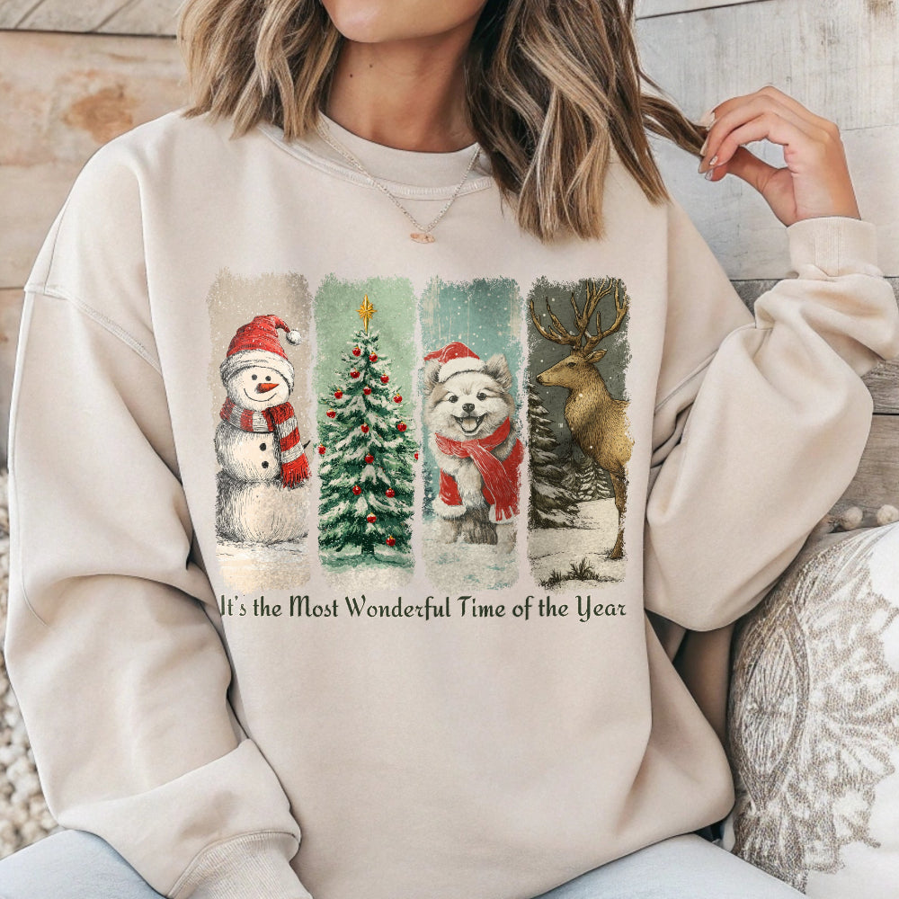 Person wearing a beige sweatshirt with Christmas-themed graphics and text.