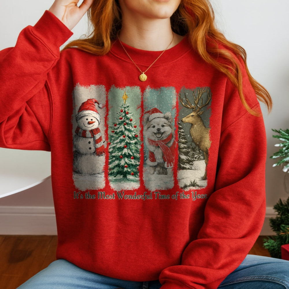 Person wearing a red sweater with Christmas-themed designs sitting in front of a decorated tree.