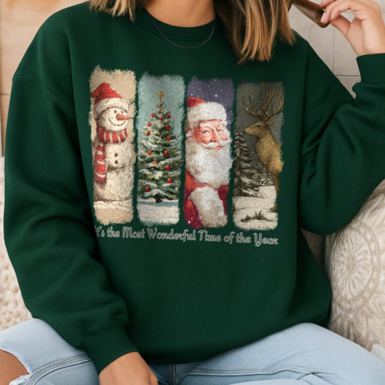 Person wearing a green sweatshirt with Christmas-themed designs and text.