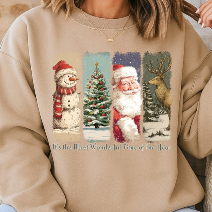 Person wearing a beige sweatshirt with Christmas-themed design sitting on a couch.
