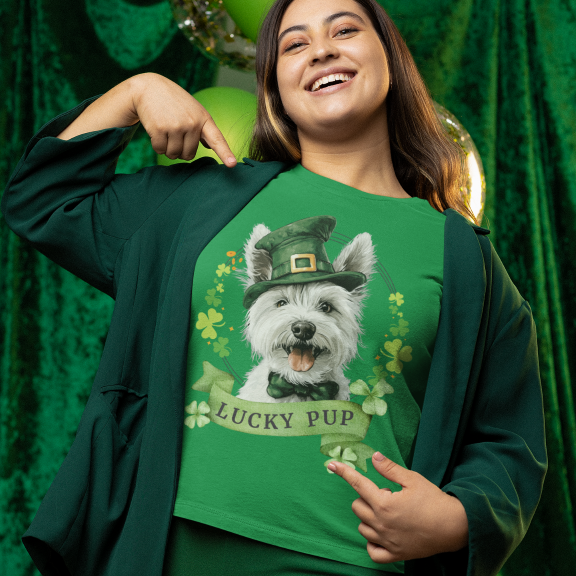 St. Patrick’s Day t-shirt featuring west highland white terrier dog with a shamrock garland and festive Irish design