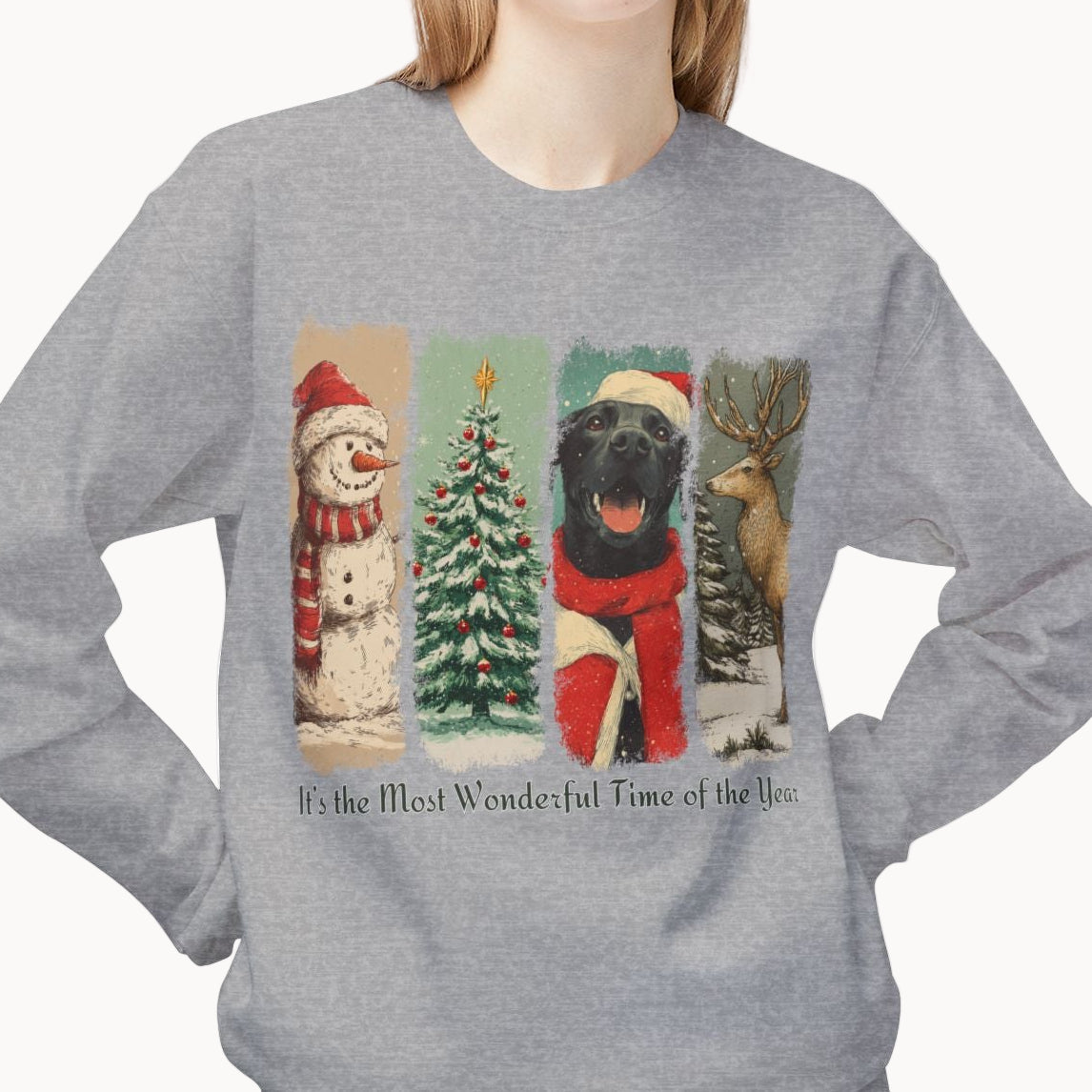 Person wearing a gray sweatshirt with Christmas-themed design