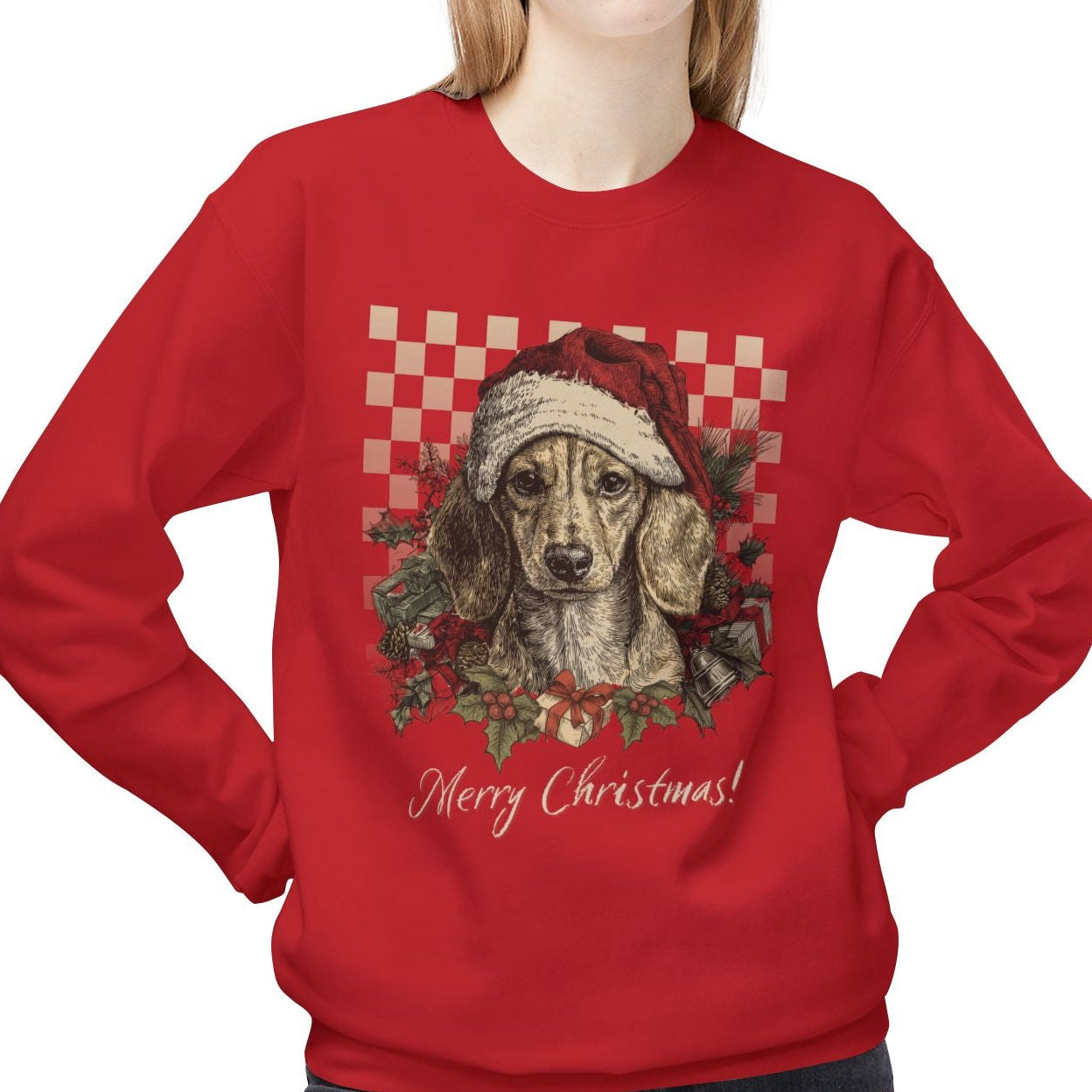 Person wearing a red Christmas-themed sweatshirt with a dog illustration on a white background